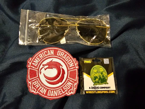 Pro Wrestling Crate Orange Cassidy Sunglasses, Danielson Patch & Young Bucks Pin Cover