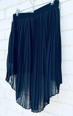 Minifalda Umgee negra plisada cintura elástica alta baja mediana Foto 1 de 3