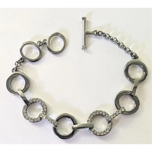 Brazalete de eslabones circulares de cristal tono bronce gris firmado por Swarovski Swan genuino - Imagen 1 de 8