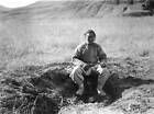 Yan'an China, portrait of man sitting over oil seep OLD PHOTO