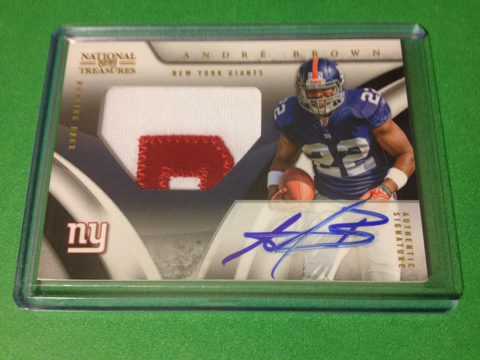 Andre Brown 2009 National Treasures GOLD Rookie 2-CLR Patch Jersey Auto /25 - Image 1 of 1