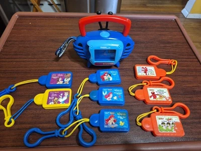 Tiger Electronics  Disney Tunes Kid Clips Radio Audio Player w 8 Song Tunes 2002 - Image 1 of 4