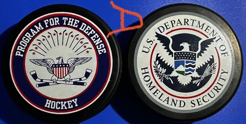 2-Vintage Homeland Security & Program For The Defense Game/Souvenir? Pucks Cover
