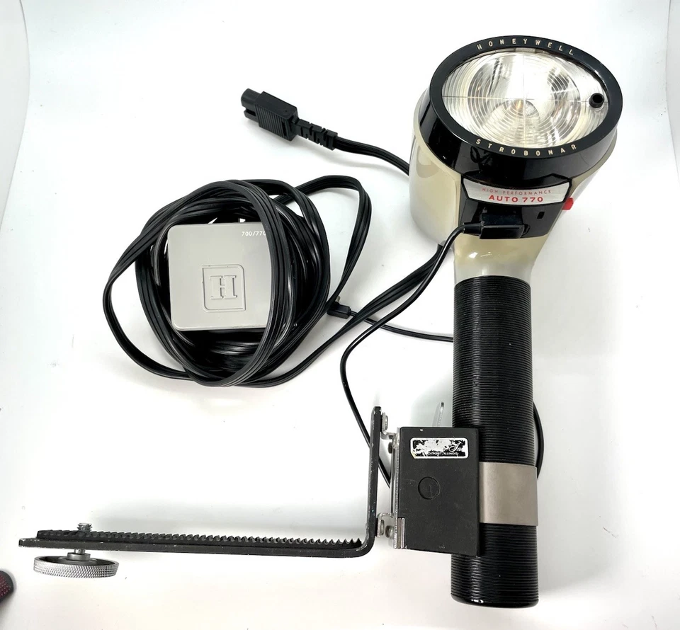 Flash de montaje en mango de alto rendimiento Honeywell Strobonar Auto 770 con montaje para cámara Foto 1 de 4