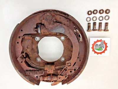 69-75 International IHC Dana 60 placa de apoio de freio carregada esquerda 12x2 1/2" sapatos - Imagem 1 de 4