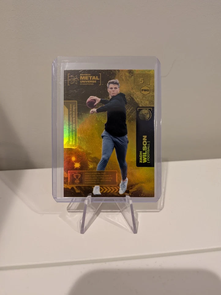 2021 UD Skybox Metal Universe Champions Zach Wilson PMG Orange #91/100 - #5 - Image 1 of 1