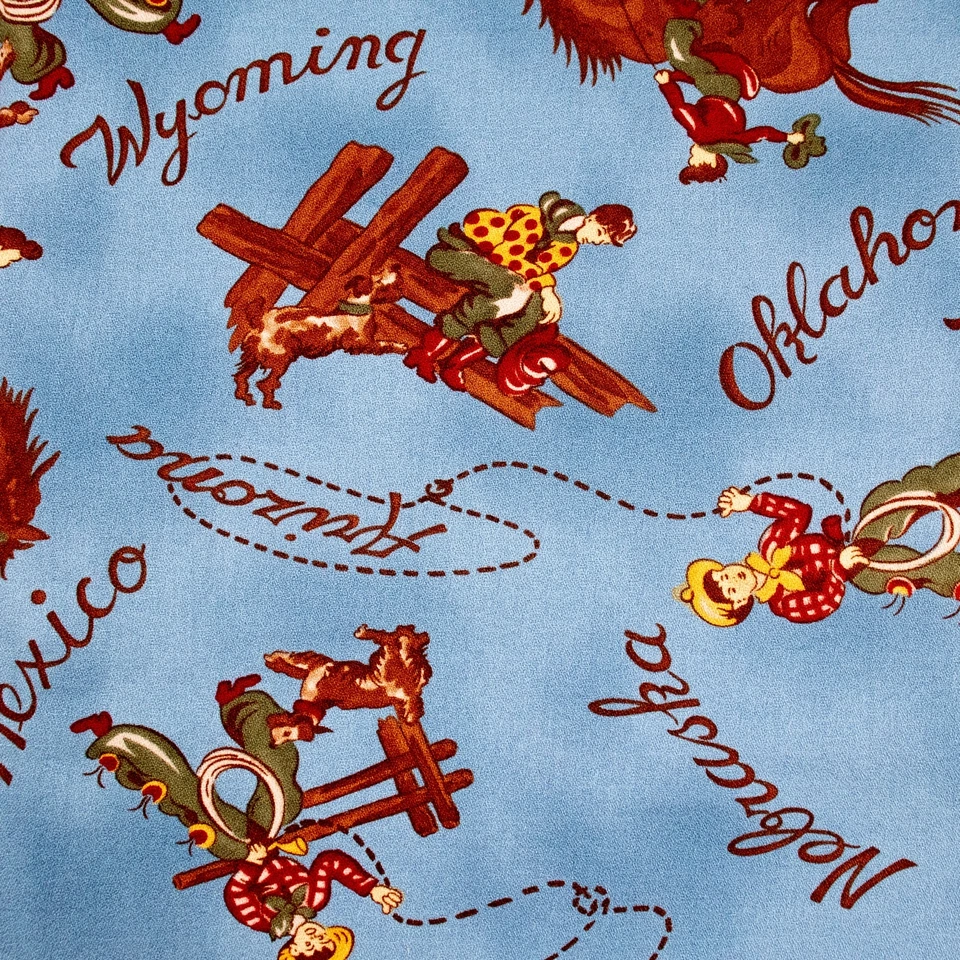 Dude Ranch Moda Barkcloth Fabric BTHY Cowboys Horses on Blue Half Yd Rising Sun - Image 1 of 3
