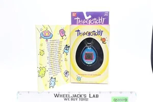 #1800 Tamagotchi bleu et rose 1997 Bandai réalité virtuelle animal de compagnie NEUF SCELLÉ - Photo 1 sur 3