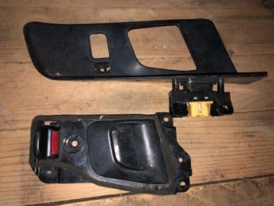 Manija puerta lado pasajero interior derecho CON BISEL 1990-94 Mitsubishi Eclipse Foto 1 de 4