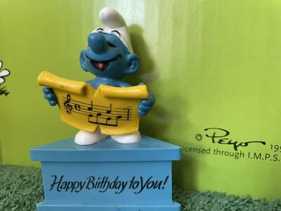 SÄNGER SCHLUMPF GEBURTSTAG DREIECKSOCKEL  SCHLÜMPFE  SMURFS PUFFI PITUFOS - Bild 1 von 2
