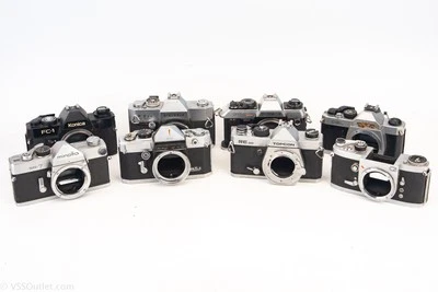 Lote de 8 cámaras fotográficas réflex vintage de 35 mm Petri Konica Topcon como están piezas reparación V7 Foto 1 de 4