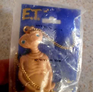 Vintage 1982 E.T. The Extra Terrestrial ET Movie Necklace in original bag unused - Picture 1 of 4