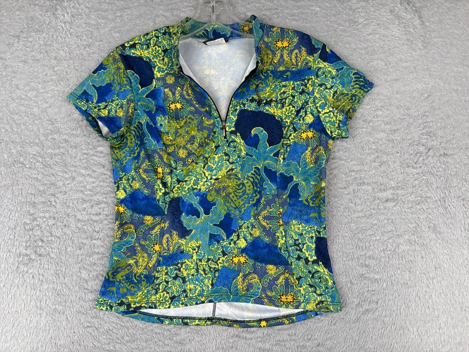 Camiseta deportiva de ciclismo SheBeest para mujer pequeña verde azul floral 1/4 cremallera 100 % poliéster Foto 1 de 4
