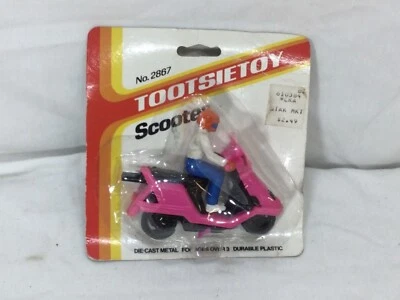 1985 Vintage Tootsie Toy Pink Scooter & Figure Diecast Carded MOC Sealed - Image 1 of 2
