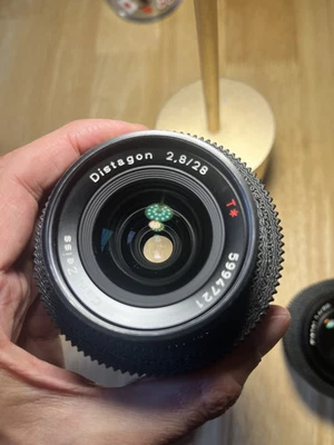 TWO x LENSES = ZEISS DISTAGON 2.8/28 T* + ZEISS PLANAR 1.4/50 -  C/Y MOUNT  - Image 1 of 4