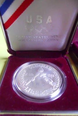 1988-S U.S. Olympic Dollar Coin... Proof... 90% Silver... OGP - Image 1 of 4
