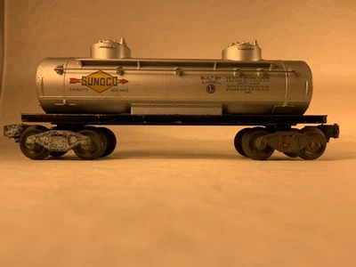 LIONEL POSTWAR 6465, SUNOCO 2-DOME TANK CAR, VARIATION B, STAPLE-END TRUCKS - Image 1 of 4