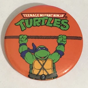 Teenage Mutant Ninja Turtles Orange Pin-back Button vintage - Picture 1 of 2