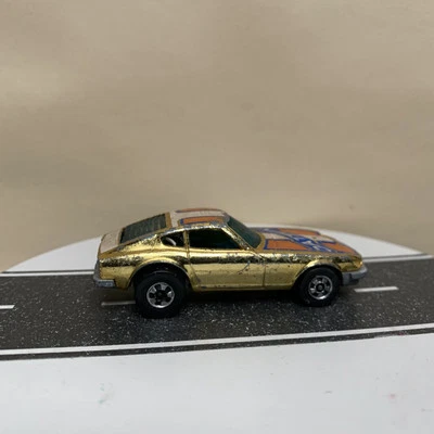 1976 Hot Wheels Super Chromes Datsun 240z Z Whiz Coupe Gold/Orange w/BW 1:64  - Image 1 of 4
