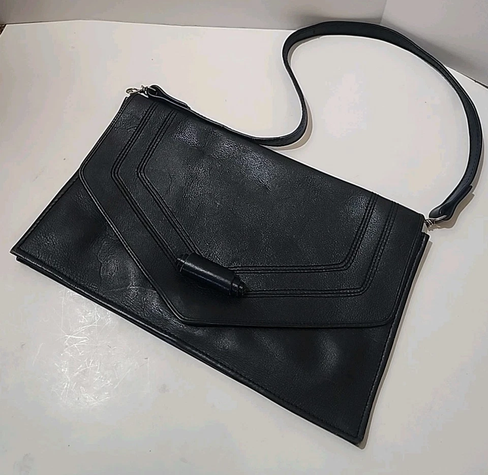Cartera clutch sobre vintage de cuero negro hecha en Columbia Foto 1 de 4