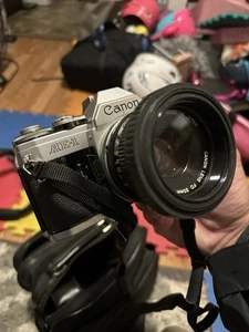Canon AE-1 analoge Spiegelreflexkamera 35 mm Produktbündel mit Objektiven & Blitz - GETESTET & FUNKTIONSFÄHIG - Bild 1 von 21