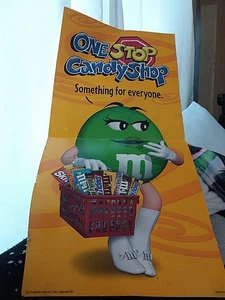 Letrero de cartón M&M usado tiene desgaste - Imagen 1 de 8
