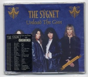 The Sygnet Maxi-CD Unload The Gun - with Live On Tour with DORO sticker - as new - Foto 1 di 1