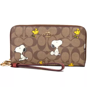 NWT Coach X Peanuts Long Zip Around Wallet With Snoopy Woodstock/Friends Motif - Picture 1 of 4