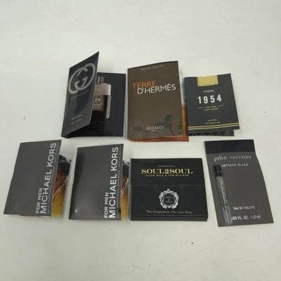 Juego de 7 frascos de muestra de colonia para hombre incluidos Hermes, Gucci, Varvatos y más nuevo Foto 1 de 4