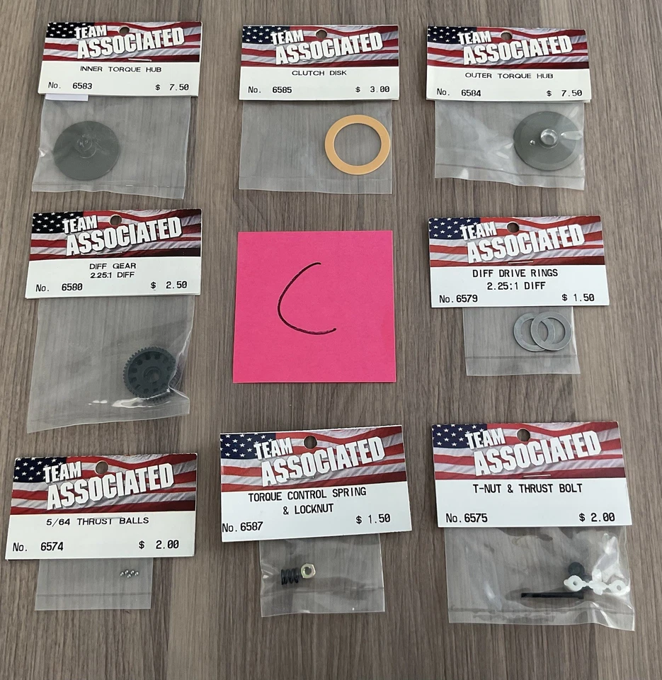 Vintage Team Associated Rc 10 Rc10T Gold Pan Stealth Transmission Parts lot C - Image 1 of 1