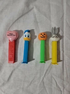 VINTAGE PEZ Spender 4 Stück Lot Made in Hungary Bugs Bunny, Donald Duck + mehr - Bild 1 von 7