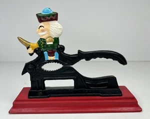Vintage Table Top Nutcracker Cast Iron Wooden Base Patriotic Man Top 7 1/2" long - Picture 1 of 11