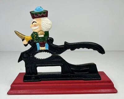 Vintage Table Top Nutcracker Cast Iron Wooden Base Patriotic Man Top 7 1/2" long - Image 1 of 4