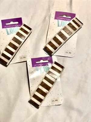 Lote de 10 pasadores gruesos marrón y crema Da Look Foto 1 de 4