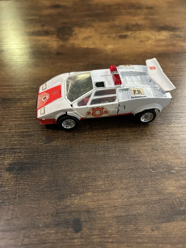 Transformers G1 ALERTA ROJA Takara 1980-82 Jefe de Bomberos Blanco Lamborghini De Colección Foto 1 de 4