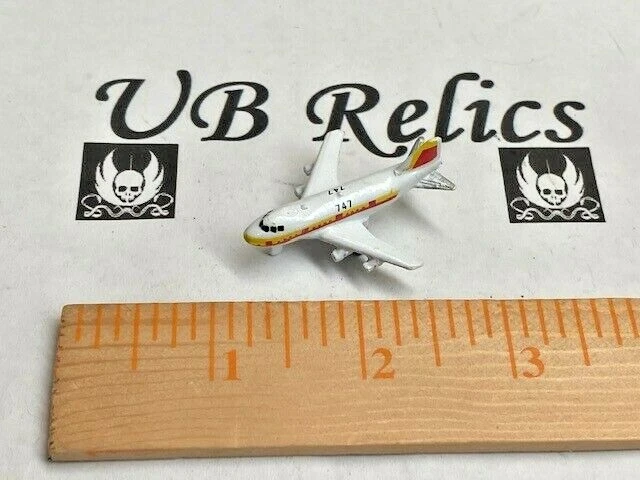 Micro Machines 1987 Galoob Boeing 747 - mini White w/ Red Yellow Stripe - Image 1 of 1