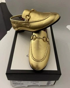 Mocasín de cuero metálico Jordaan dorado para niñas Gucci nuevo en caja talla EE. UU. 1/EU 32 - Imagen 1 de 6