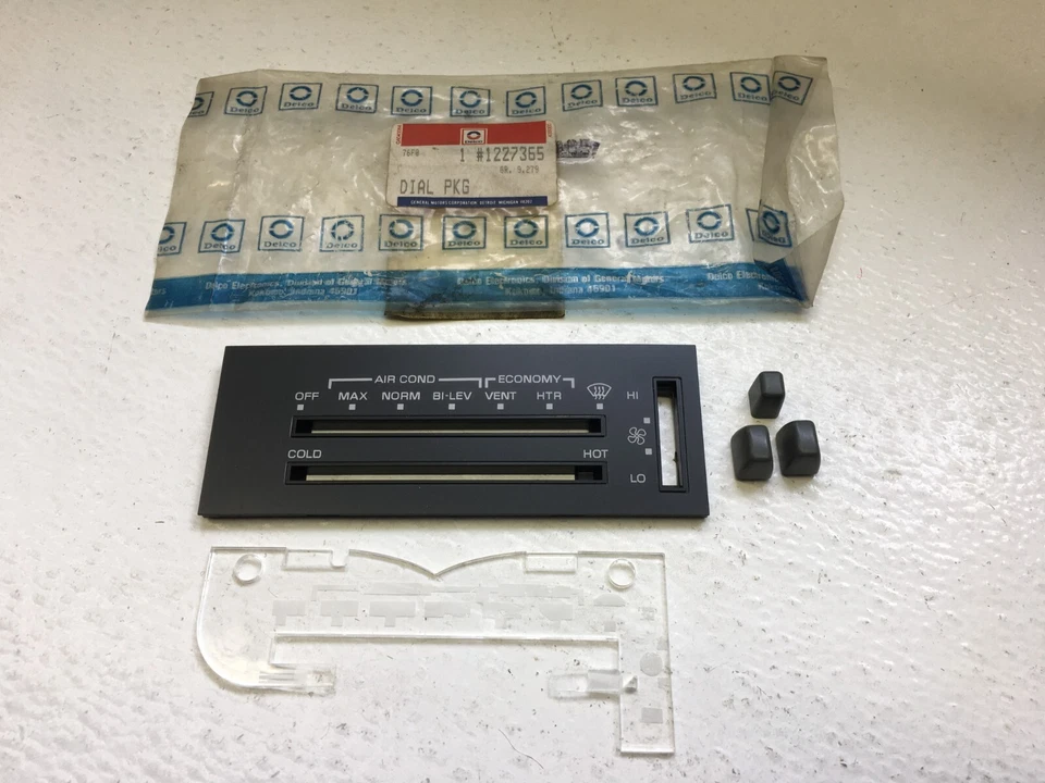 Placa frontal de control de calefacción Pontiac 6000 GM NOS 1986-91 con perillas 1227365 Foto 1 de 4