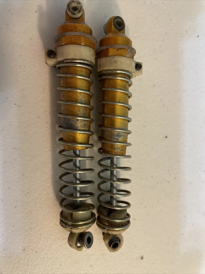 RC10 6010 Gold TEAM ASSOCIATED VINTAGE RC10 BUGGY Rear SHOCKS - Image 1 of 4