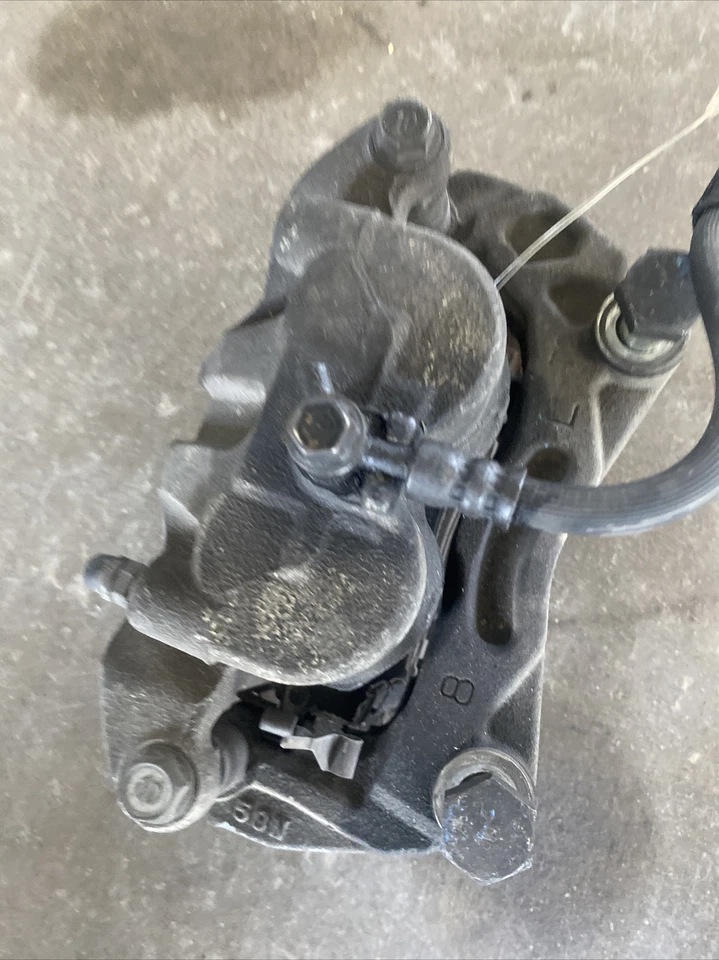 Pinza de freno delantera izquierda Infiniti M35 M45 06-10 41011-EG000 Foto 1 de 3