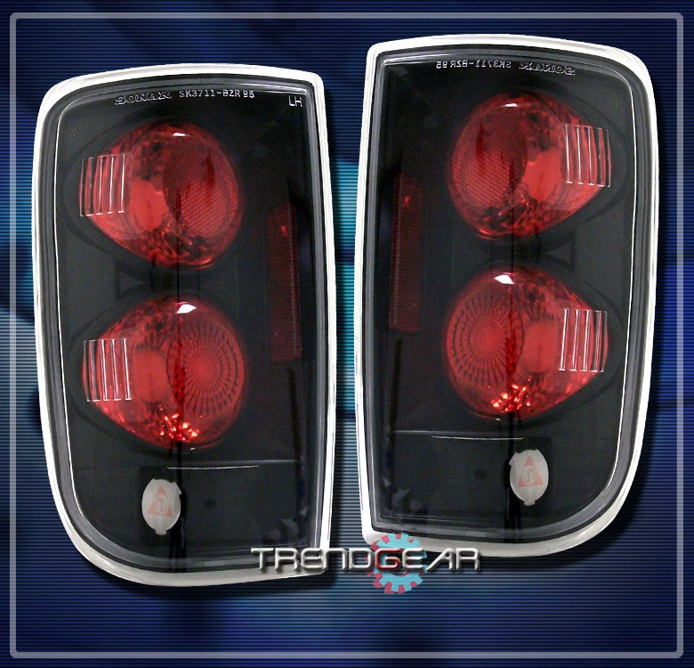 1995-2004 CHEVY/GMC BLAZER JIMMY ENVOY BRAVADA ALTEZZA TAIL LIGHT LAMP BLACK SLS - Image 1 of 1