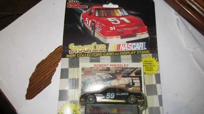 RACING CHAMPIONS #59 ROBERT PRESSLEY, CHEVY STOCK CAR/COLLECTORS CARD/STAND NOS - Image 1 of 2