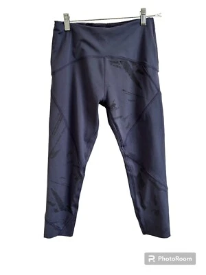 Leggings deportivos capri para mujer talla pequeña azul profundo patrón bolsillos de compresión Foto 1 de 4