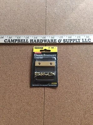 Soportes planos Stanley Bright de latón macizo de 2" Foto 1 de 2