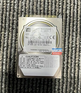 Disque dur HDD TOSHIBA MK8025GAS 80 Go 2,5" 4200 tr/min 8 Mo PATA - Photo 1/2
