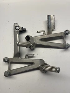1997 HONDA CBR600F3 REAR PASSENGER FOOT PEGS STANDS RESTS SET - Picture 1 of 10