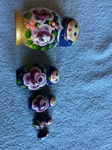 navy blue and gold nesting doll with purple flowers - Bild 1 von 3