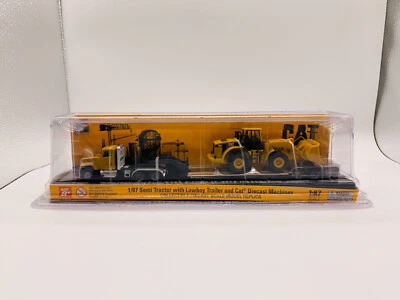 Трактор с дневной кабиной Cat CT681 и низкобойный прицеп и колесный погрузчик 950G 1:87 DM 84418 - Изображение 1 из 4