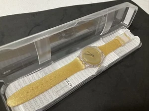 NEW✅ SWATCH Originals NUIT DOREE Gold Glitter 41mm Clear Watch SUOK122 - Picture 1 of 2
