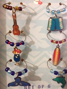 Neu im Karton - Island Charm Getränkemarker 6er Set - Ukulele, Brandung, Delfin, Wal - Bild 1 von 3